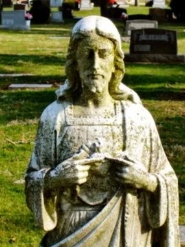 Statue jesus with moss Fotos Stock
