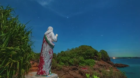 Statue of Jesus on the seashore and starry sky Stock Footage 196804846