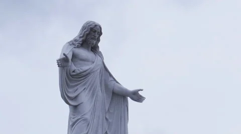 Statue of Jesus, the sky with clouds, day, timelapse Stock Footage 63814699