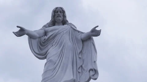Statue of Jesus, the sky with clouds, day, timelapse Stock Footage 63814772