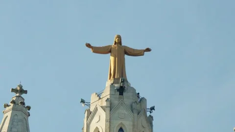 A statue of Jesus on top of a building Stock Footage 247218885
