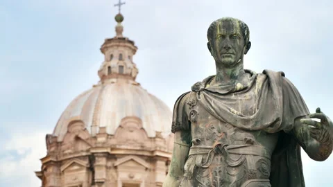 Statue of Julius Caesaer located in the centre of Rome, Italy. Buildings on the Stock Footage 201127888