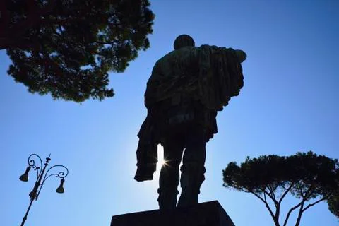 Statue of Julius Caesar against sky Stock Photos