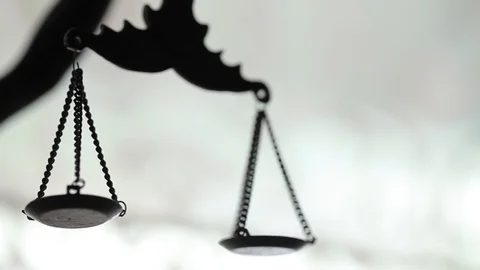 Statue of justice with weights macro video glidetrack Stock Footage 95331405