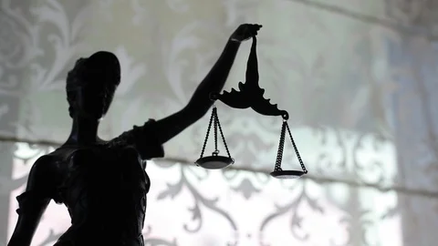 Statue of justice with weights macro video glidetrack Stock Footage 95331467