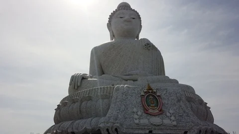 A statue of a large Buddha on a mountain in Phuket, Thailand Stock Footage 127558741