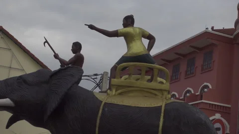 Statue large man on elephant along streets of siem reap Stock Footage 229825469