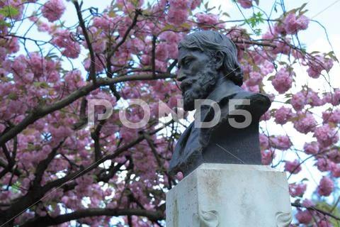 Statue of léon valade (1841-1883) in jardin botanique, public Stock Photos