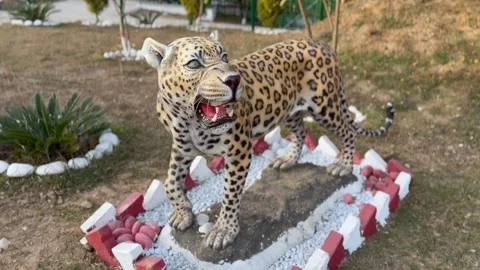 Statue of leopard in the zoo Stock Footage 327384117