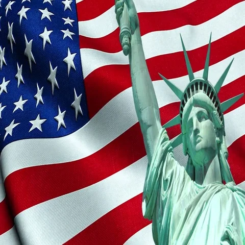 Statue of Liberty of American USA with waving flag in background Stock Footage 69410853