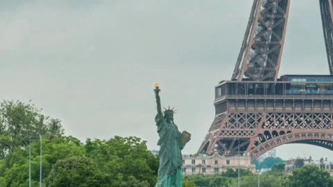 The Statue of Liberty and the Eiffel Tower Timelapse. Paris, France Stock Footage 236709600