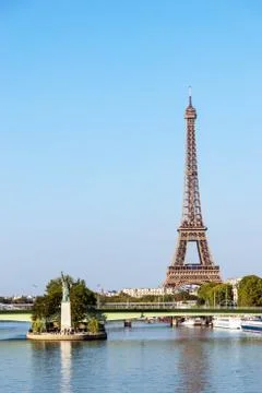 Statue of Liberty and Eiffel tower - Paris, France Stock Photos