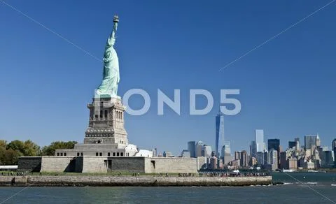 The Statue of Liberty and Manhattan Stock Photos