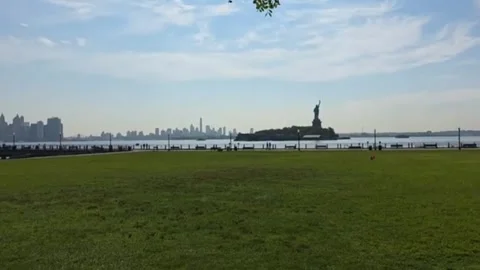 Statue of Liberty and Manhattan Skyline from Liberty State Park Stock Footage 343572035