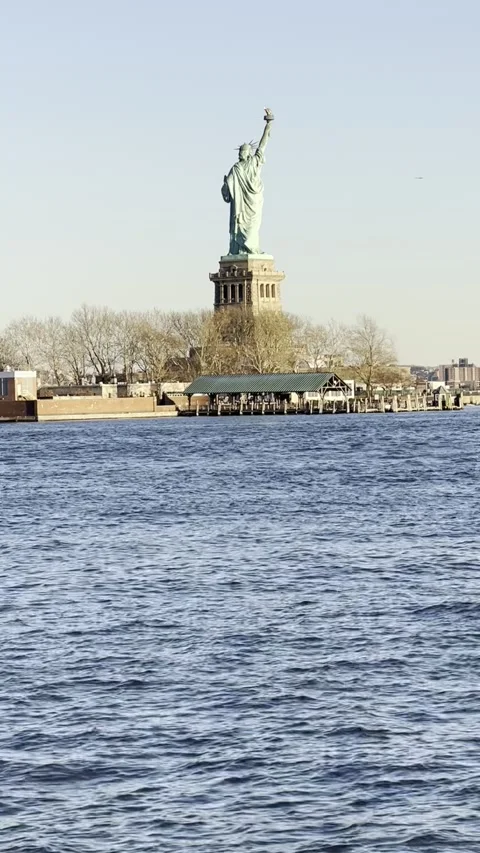 Statue of Liberty Back View at Sunset, New York City Landmark Stock Footage 328020395