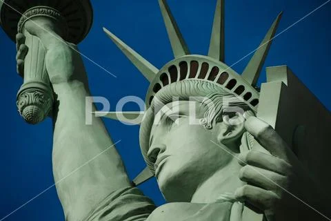 The Statue of Liberty is a colossal copper statue designed by Auguste Bartholdi Stock Photos