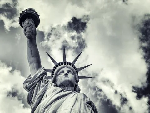 The Statue of Liberty with a dramatic sky Stock Photos