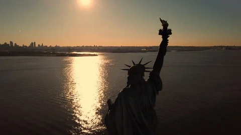 Statue of Liberty during day sunset aerial circling medium shot NYC 4K 1080 HD Stock Footage