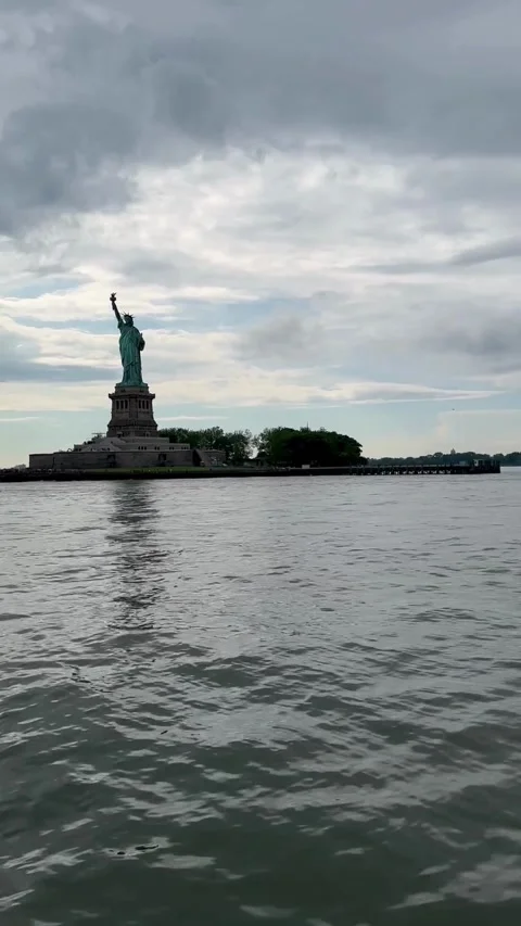 Statue of Liberty with Lower Manhattan Seen from Harbor Ferry Stock Footage 316980064