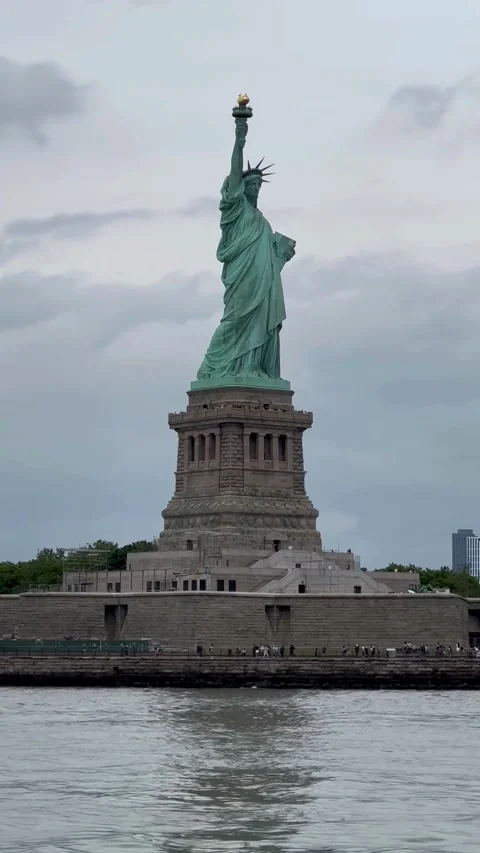 Statue of Liberty with Lower Manhattan Seen from Harbor Ferry Stock Footage 316980118