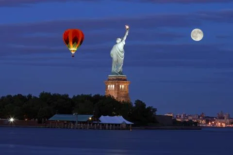 The Statue of Liberty at night Stock Photos
