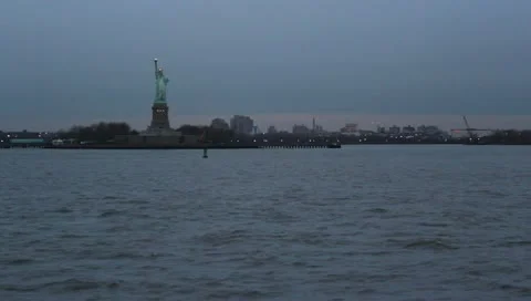 Statue of Liberty pass-by evening Stock Footage 10991919