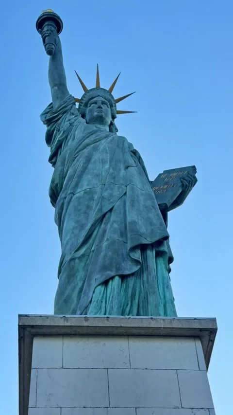 Statue of Liberty replica against blue sky in Paris, France. Vertical format Stock Footage 336900218