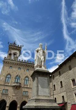Statue of Liberty in San Marino Country and the ancient palace called Palazzo Stock Photos