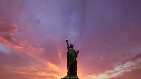 Statue of Liberty Silhouette Dramatic Purple Sunset Sky Background Stock Footage 337814840