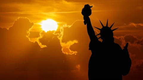 Statue of Liberty Silhouette, Time Lapse at Sunset with Red Sun and Fiery Sky Stock Footage 155170271