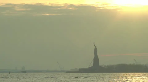 Statue of Liberty at sunset 1 Stock Footage 25629172
