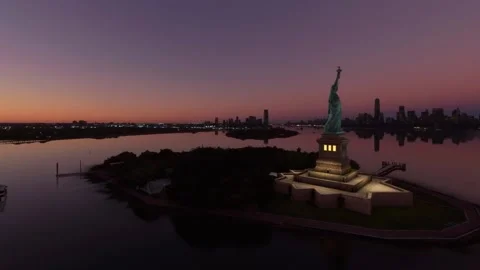 Statue of Liberty Sunset Fly By Video stock 161605460