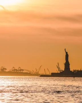 Statue of Liberty at sunset Stock Photos