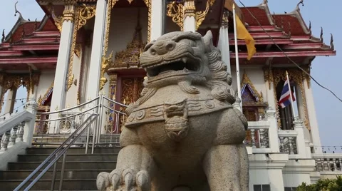 Statue of the lion in front of Buddhist temple in Thailand Stock Footage 48509038
