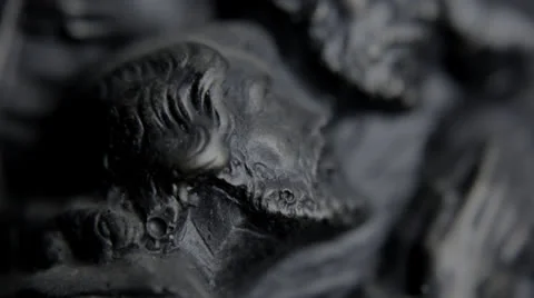 Statue Lust Supper - Tilt Up - Begging Stock Footage 24397418