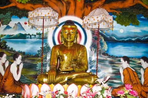 Statue made with real solid gold of gautama Buddha in a rural village for wor Stock Photos