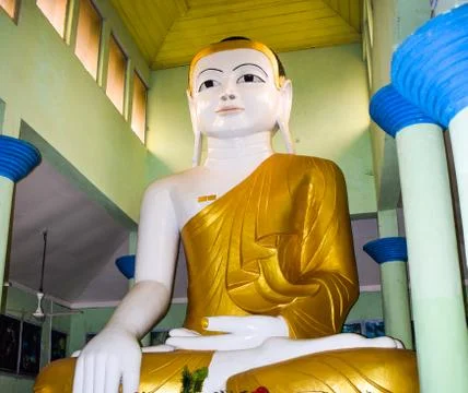 A statue made with real solid gold of gautama Buddha in a rural village for w Stock Photos