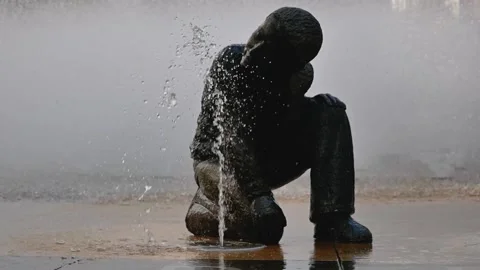 Statue made of stone - a boy drinks water from a fountain. Spain Video stock 144809405