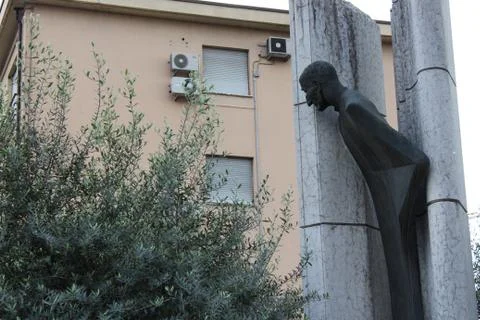 Statue of a man in a security watch Stock Photos