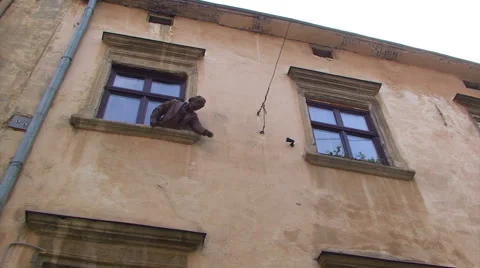 Statue of man shouting from second floor window, Lviv Stock Footage 52078482