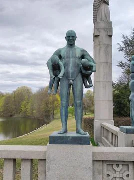 Statue of a man with two babies in Frogner Park, Oslo, Norway Stock Photos