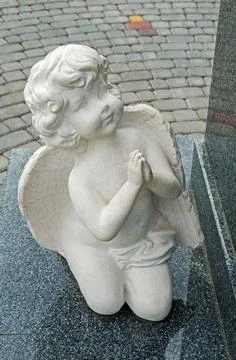 Statue marble grieving angel Stock Photos