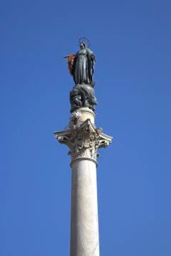 Statue of Mary on Pillar Stock Photos