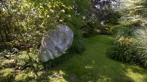 Statue of a mask in nature   Stock Footage 111007881