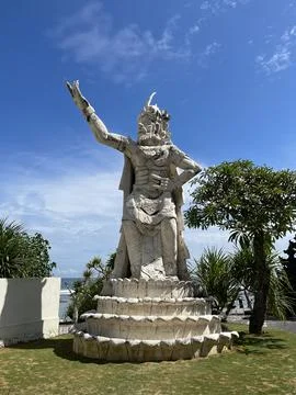 Statue on melasti beach Stock Photos