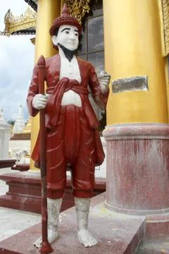 Statue near temple Stock Photos