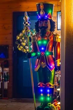 A statue of the Nutcracker stands on the doorstep of the house. 스톡 사진