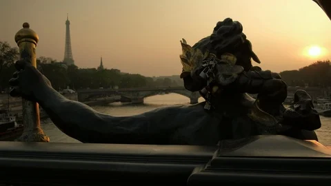 Statue of Nymphs with locks on Alexandre III bridge at sunset time, Paris Stock Footage 113188459