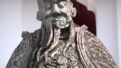 Statue of an old man with a staff in a thai temple Stock Footage 149234191