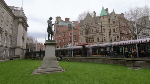 Statue of Oliver Coldsmith in front of Trinity College entrance Dublin Republ Stock Footage 108858091